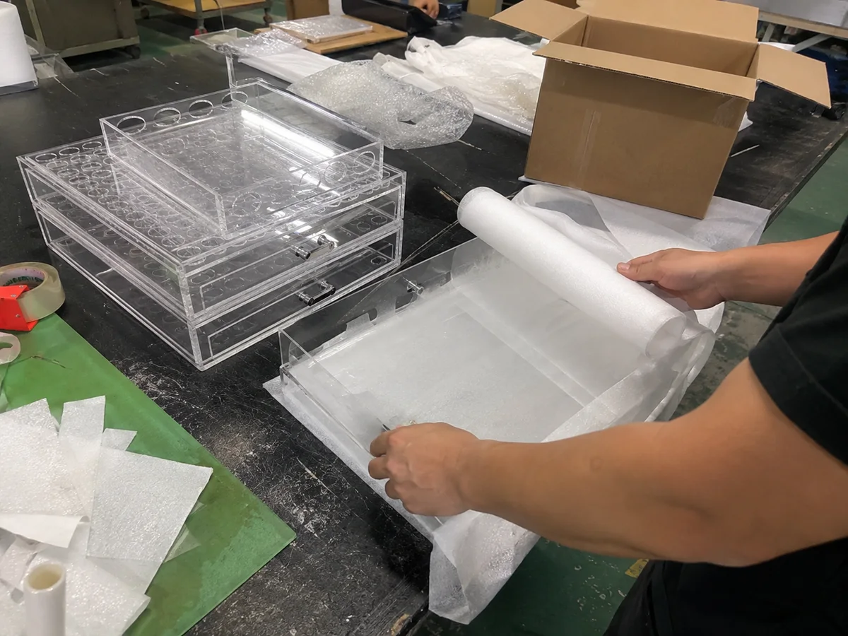 Clear acrylic parts wrapped with protective film before packing