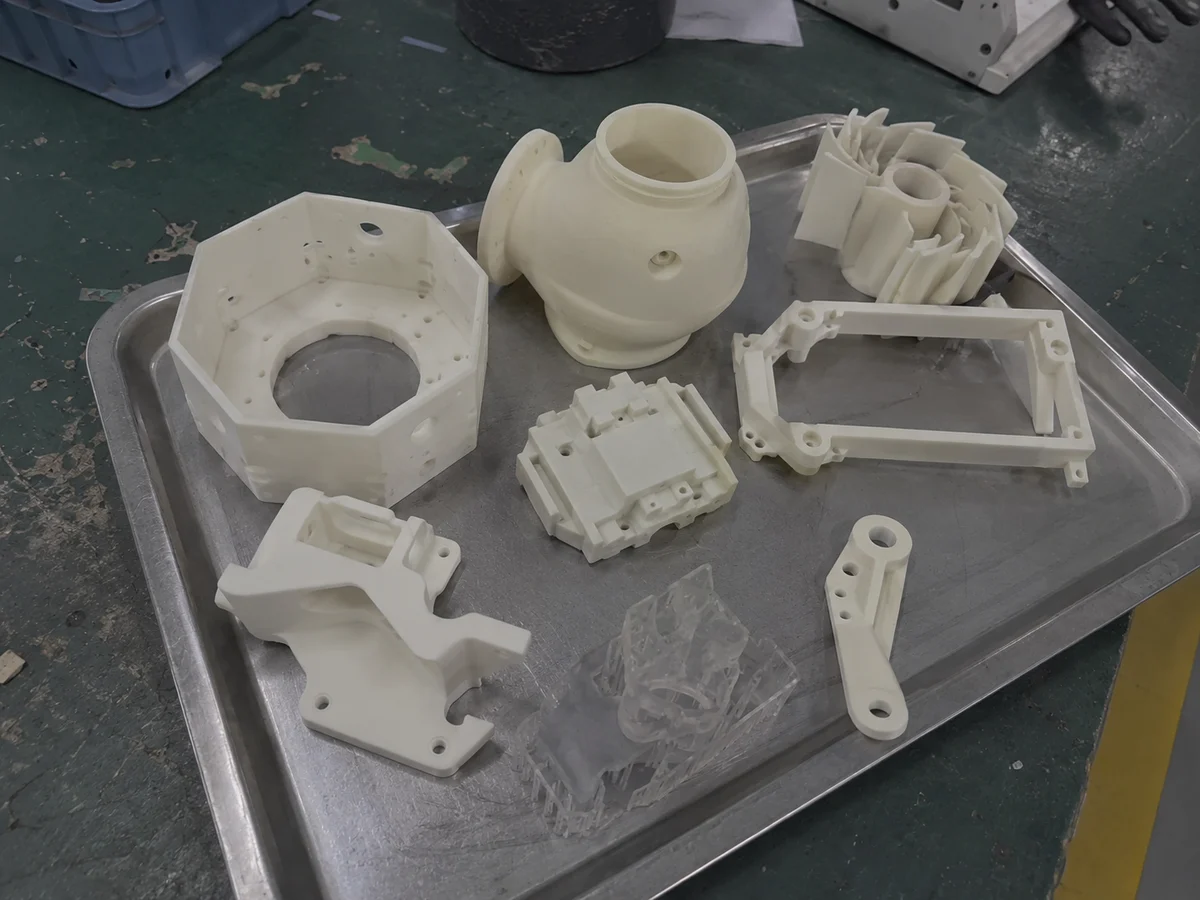 3D printed prototype samples on a factory tray