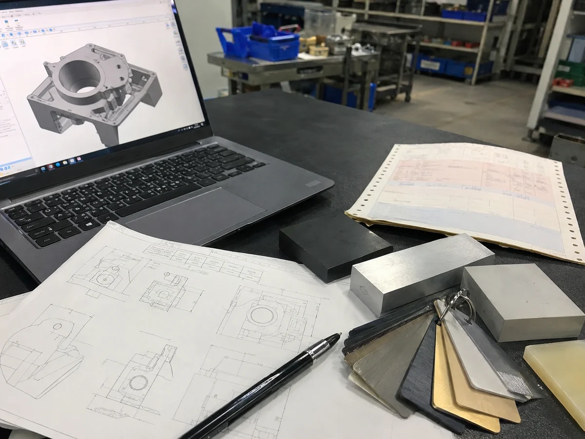 RFQ checklist desk with prototype samples and material references